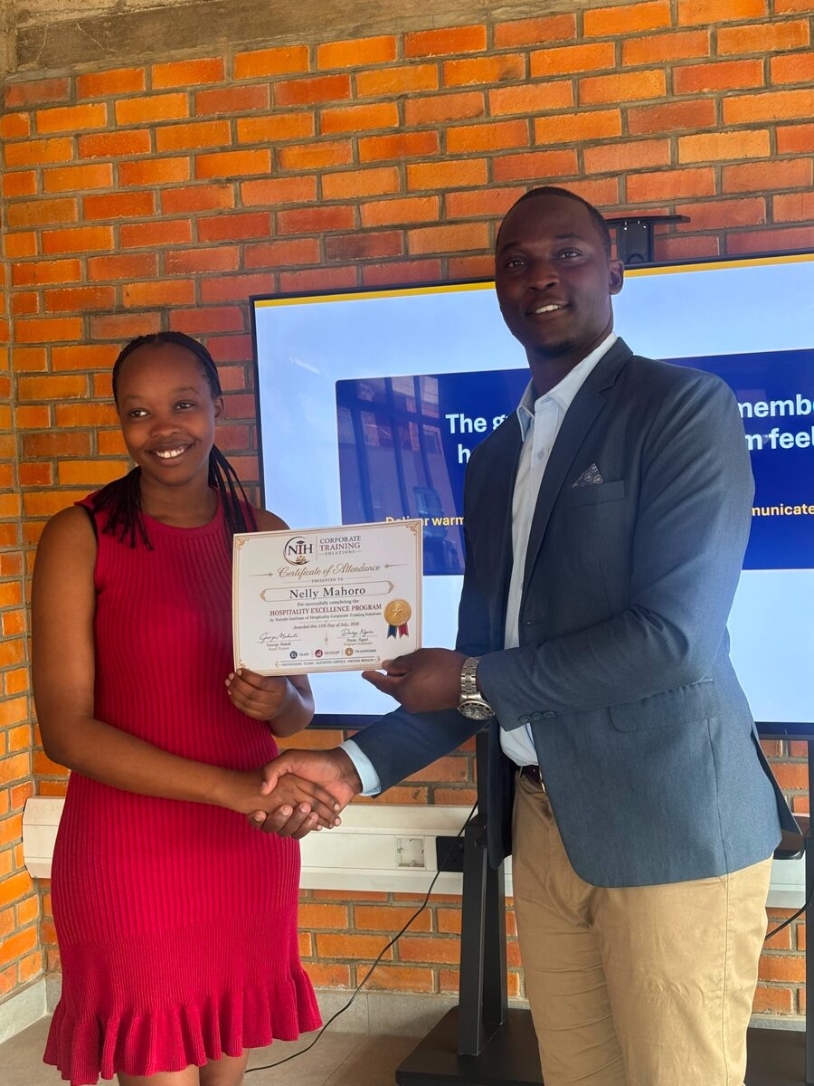 Hospitality professional receiving an NIH training certificate