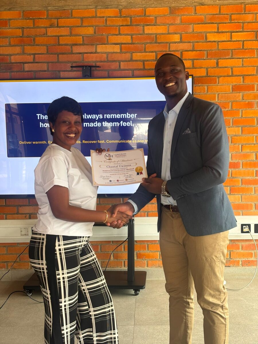 Hospitality professional receiving an NIH training certificate