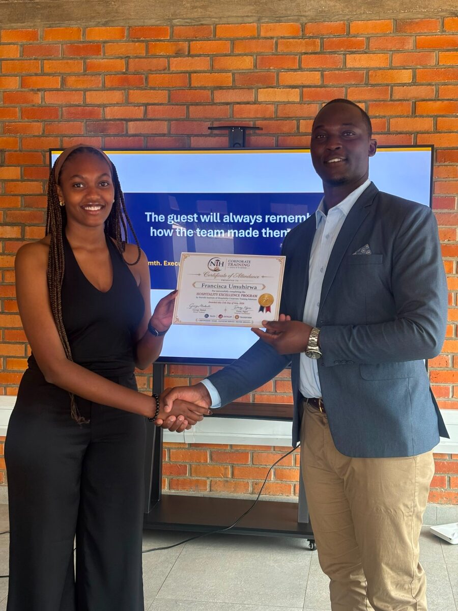 Hospitality professional receiving an NIH training certificate