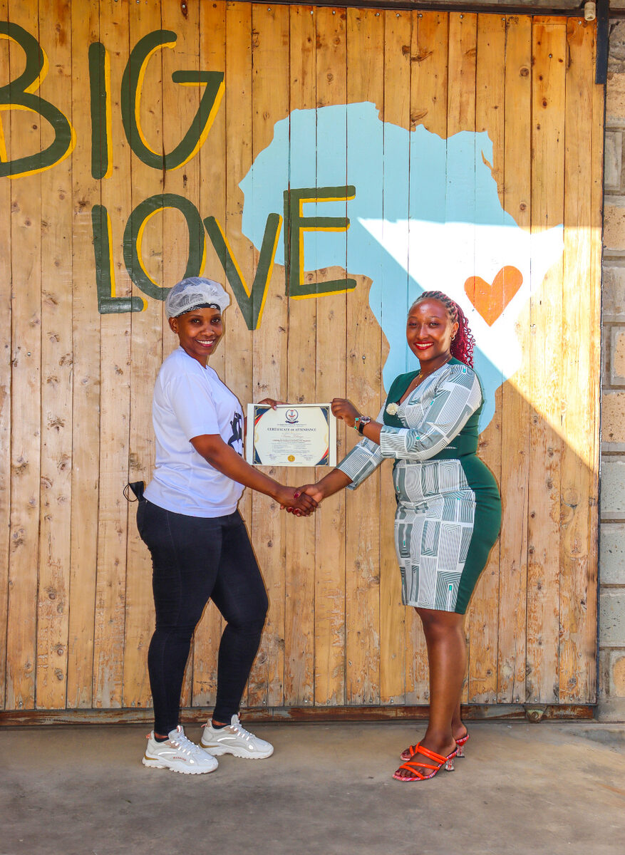Hospitality professional receiving a training certificate