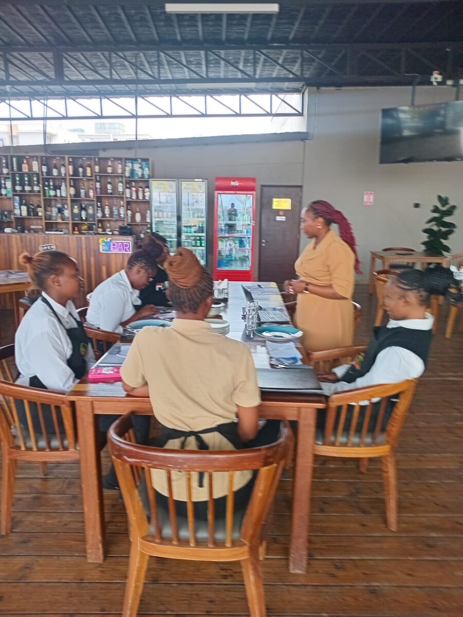 Restaurant team receiving practical service training